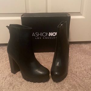 Never Worn platform bootie (3.5 in. heel)